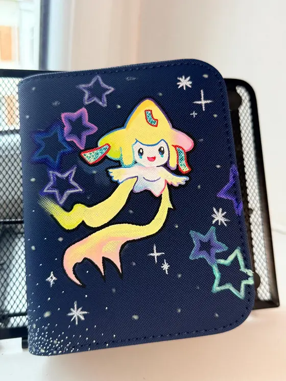 Custom handpainted glow in the dark Jirachi Pokémon binder