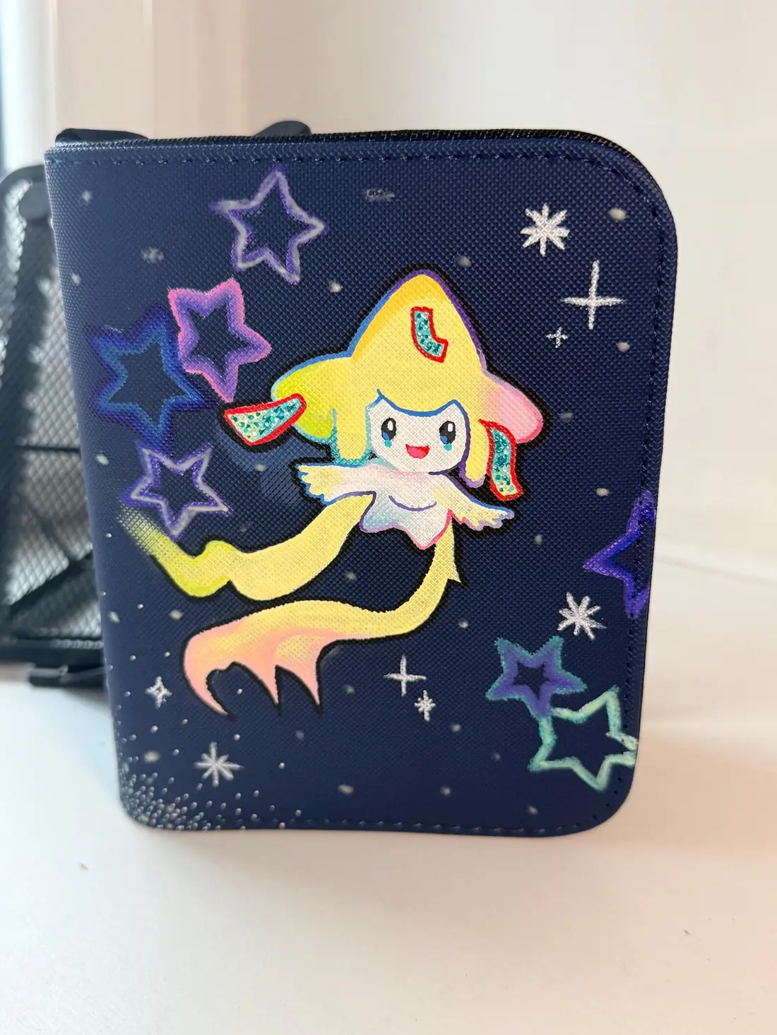 Custom handpainted glow in the dark Jirachi Pokémon binder