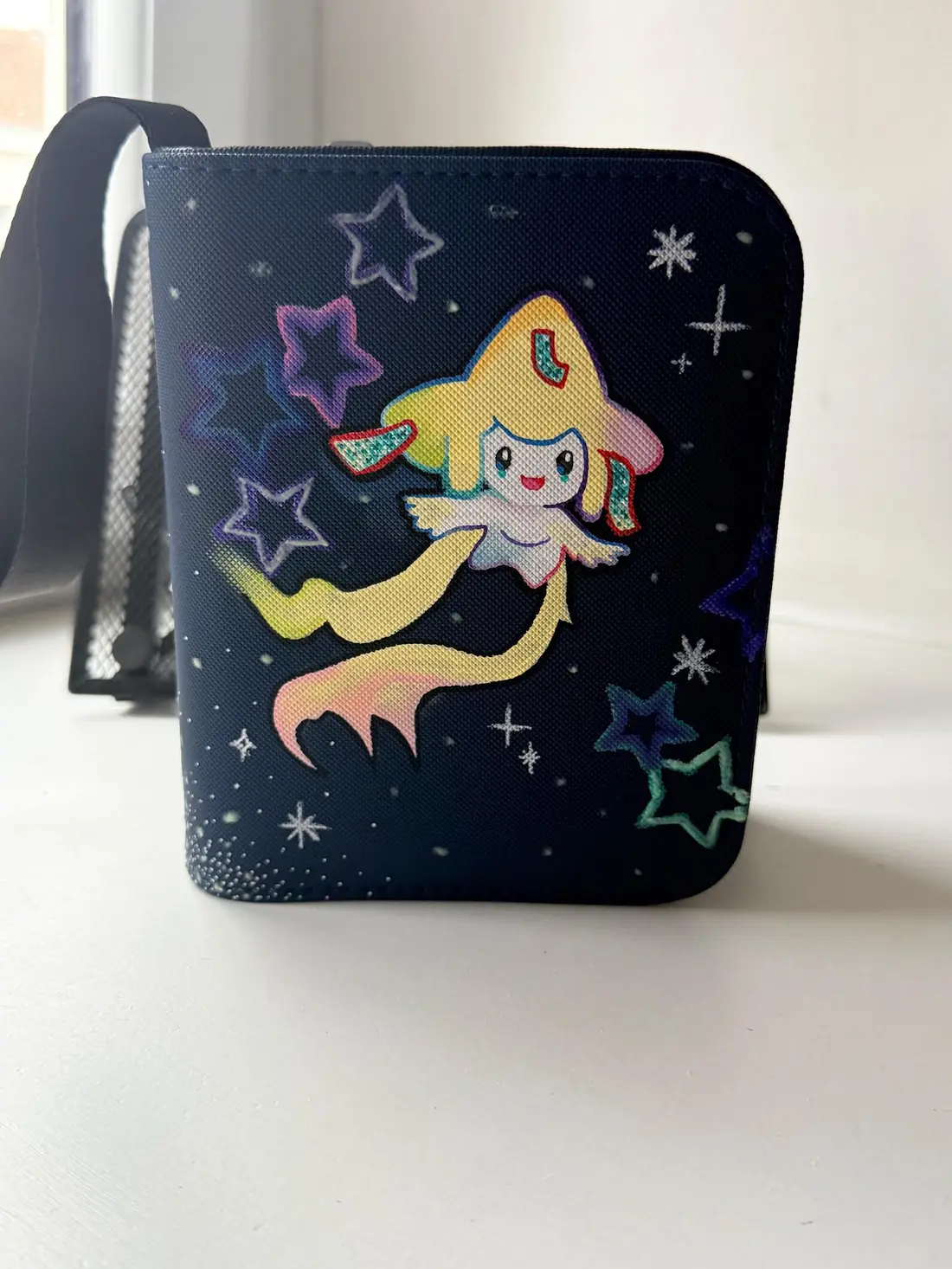 Custom handpainted glow in the dark Jirachi Pokémon binder