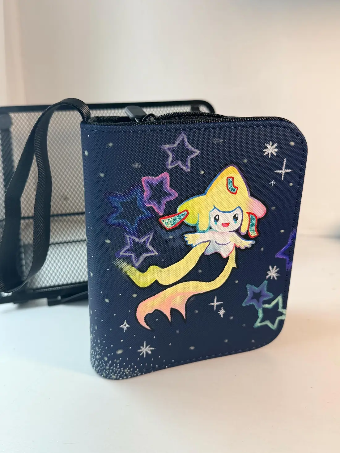 Custom handpainted glow in the dark Jirachi Pokémon binder