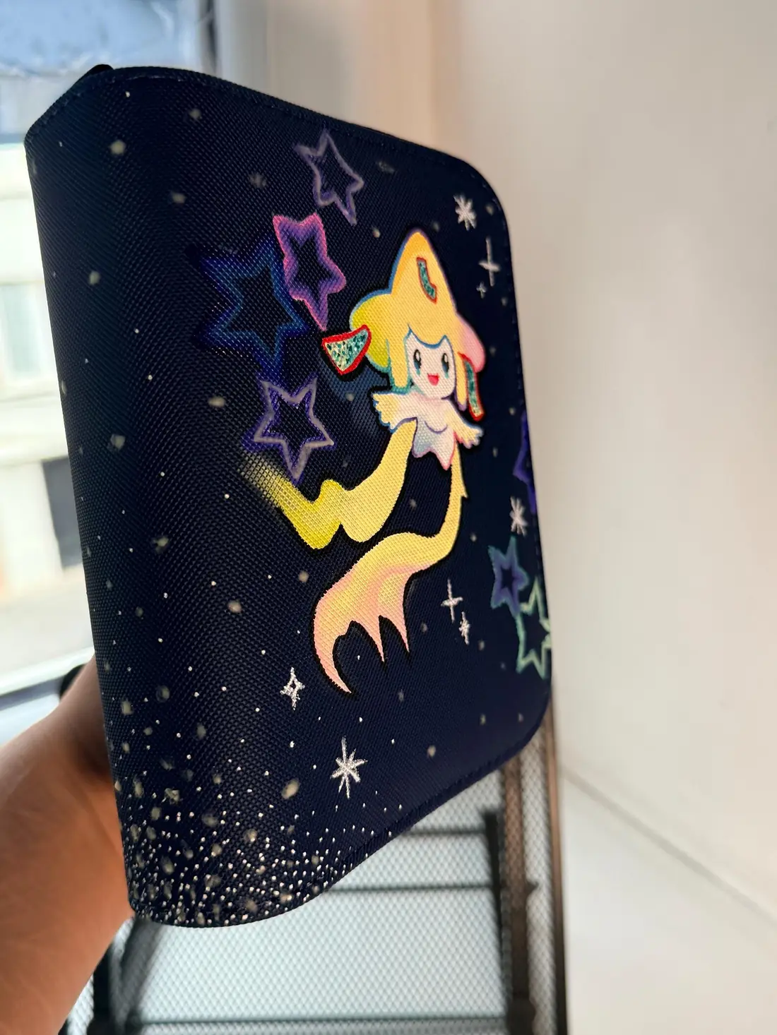 Custom handpainted glow in the dark Jirachi Pokémon binder
