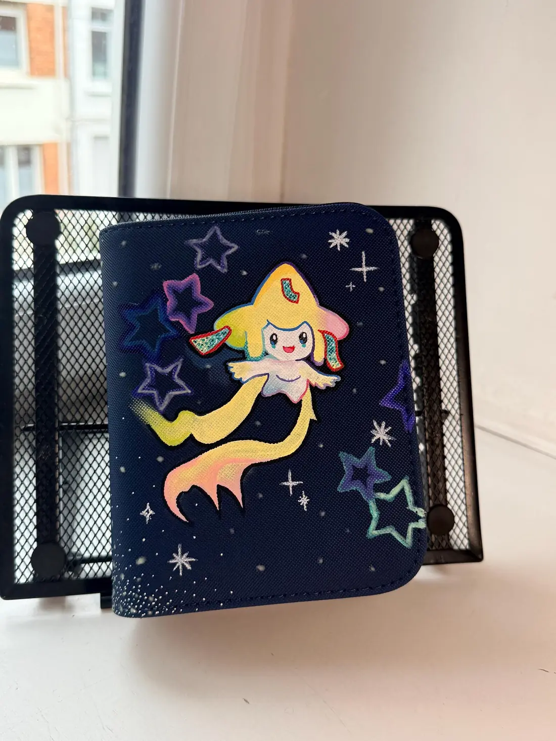 Custom handpainted glow in the dark Jirachi Pokémon binder