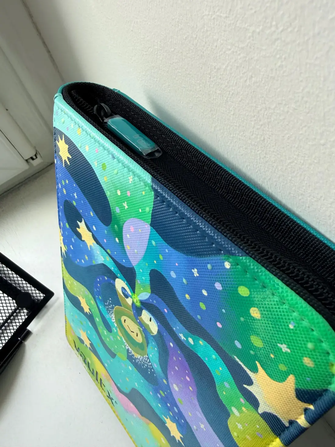 Custom handpainted glow in the dark Budew Pokémon VaultX binder
