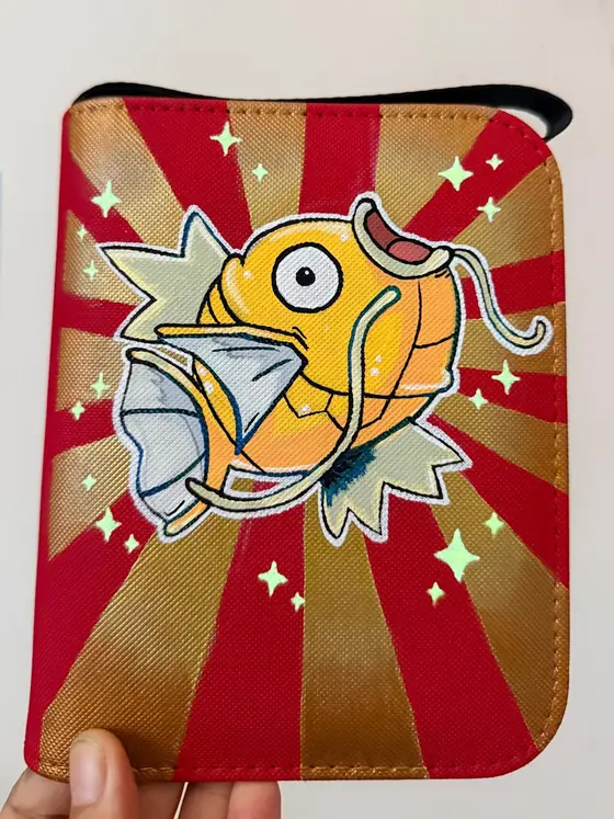 Custom handpainted glow-in-the-dark Shiny Magikarp toploader binder