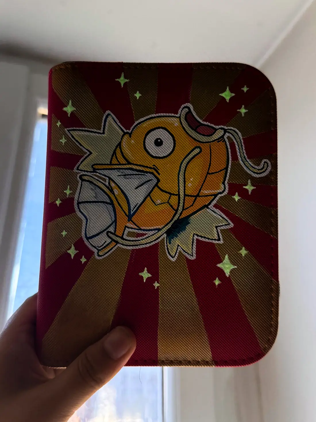Custom handpainted glow-in-the-dark Shiny Magikarp toploader binder