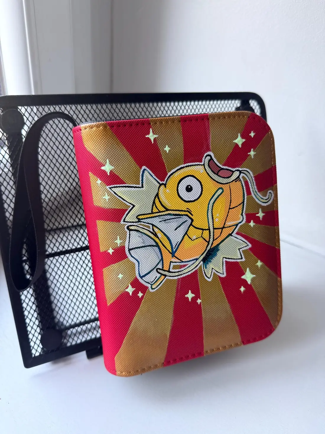 Custom handpainted glow-in-the-dark Shiny Magikarp toploader binder