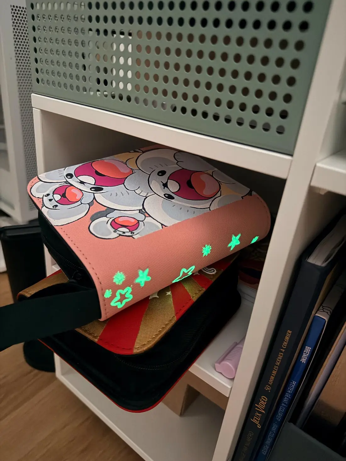 Custom handpainted glow-in-the-dark Shiny Maushold toploader binder