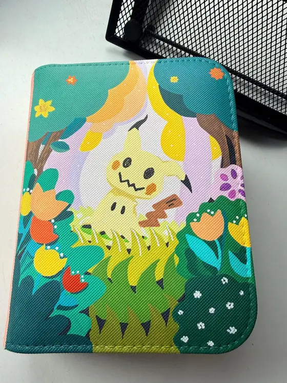 Custom handpainted Pokémon Mimikyu toploader binder