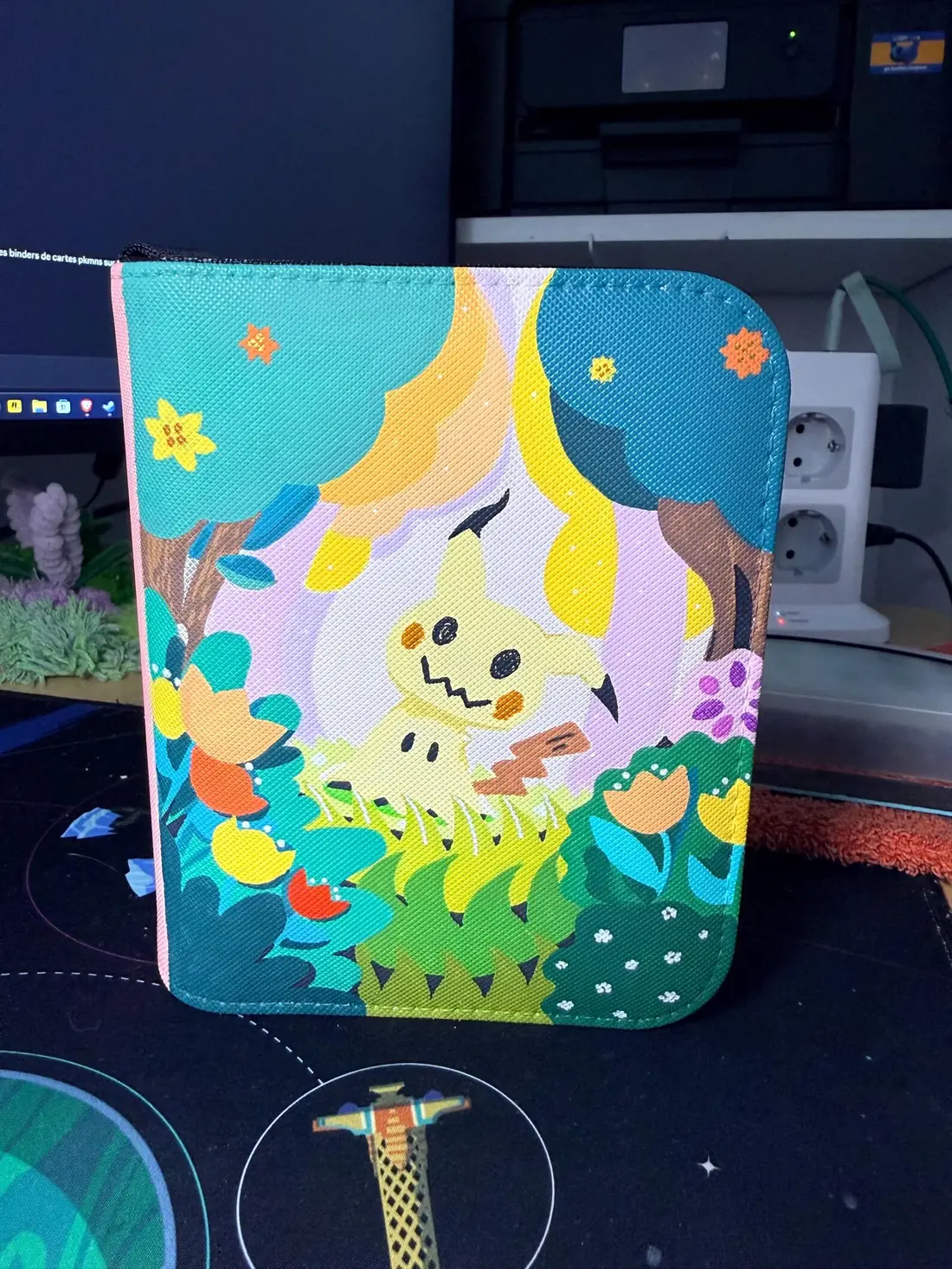 Custom handpainted Pokémon Mimikyu toploader binder
