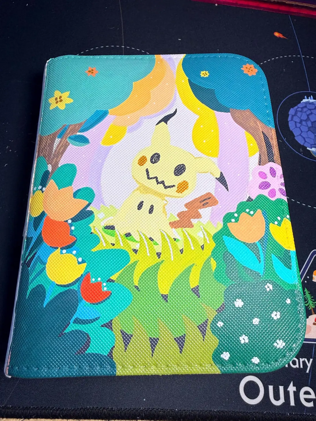 Custom handpainted Pokémon Mimikyu toploader binder