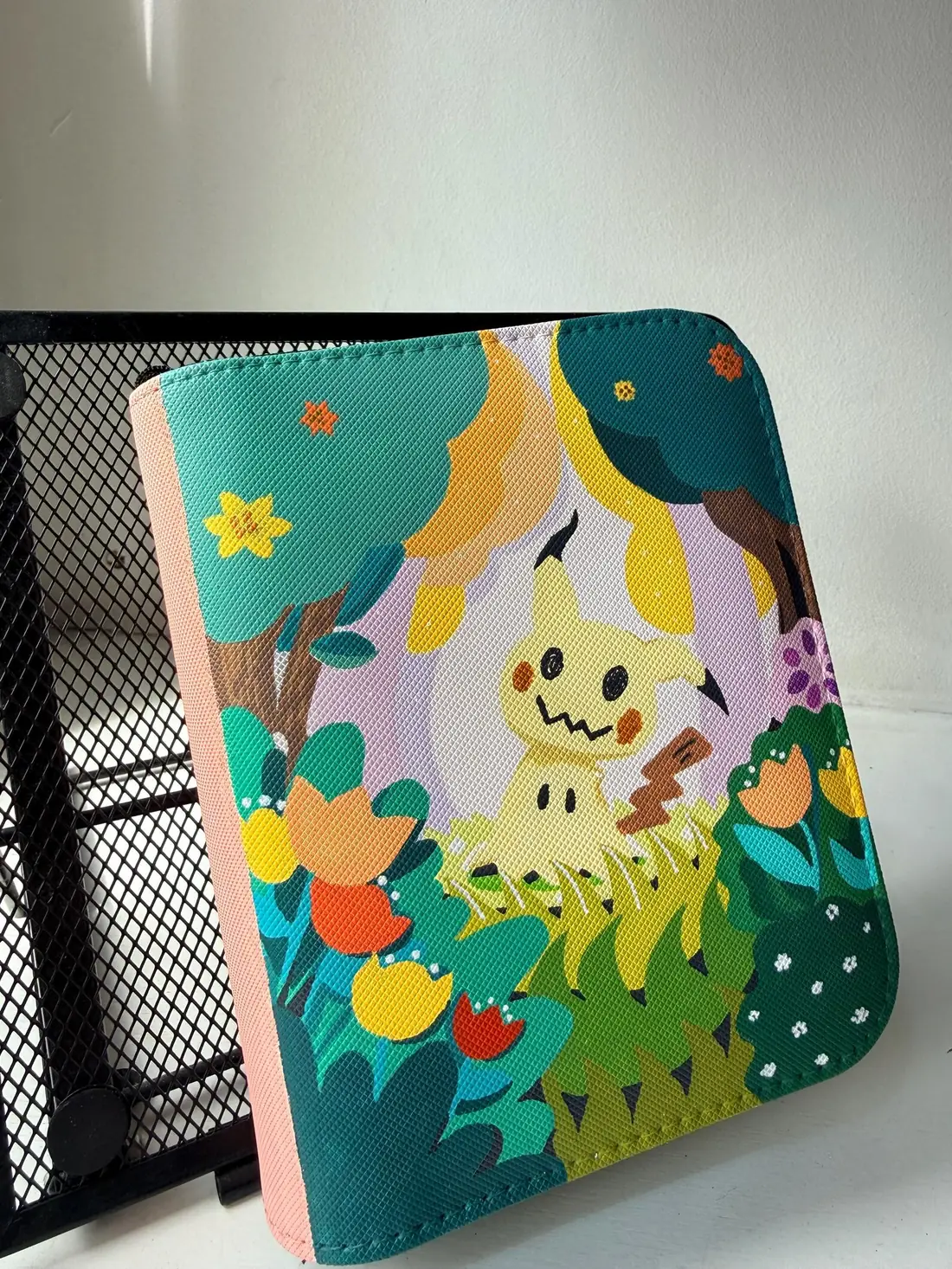Custom handpainted Pokémon Mimikyu toploader binder