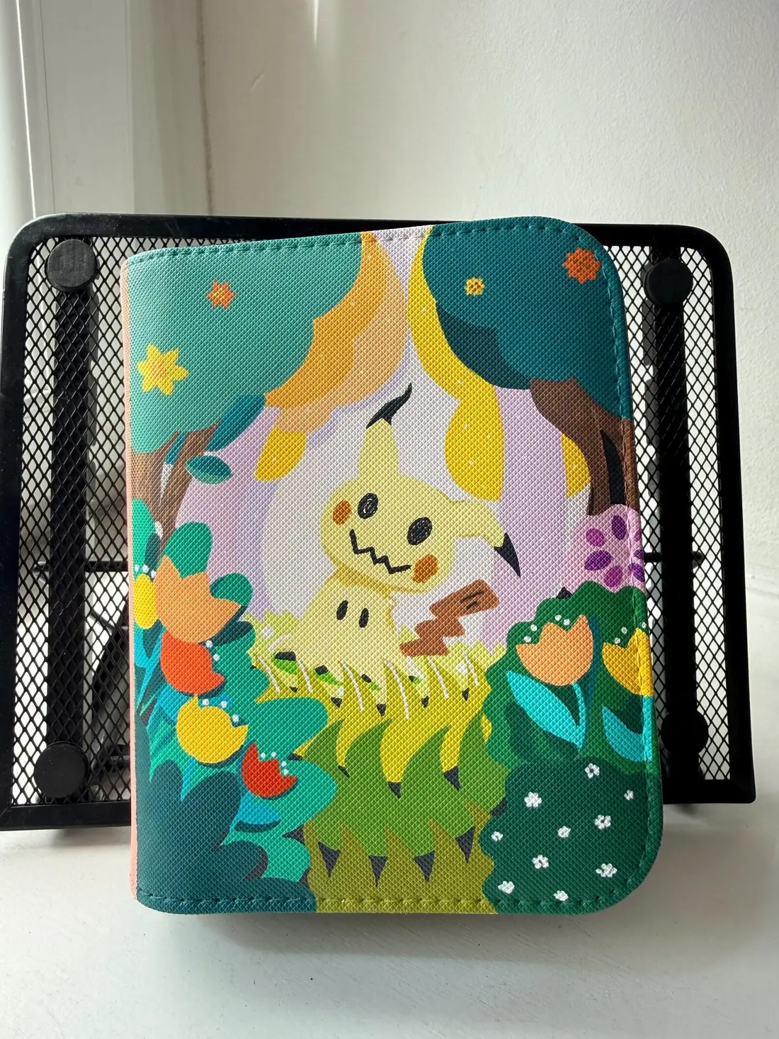 Custom handpainted Pokémon Mimikyu toploader binder